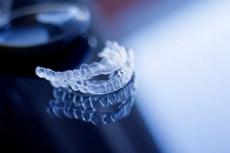 Zakończenie leczenia nakładkami Invisalign